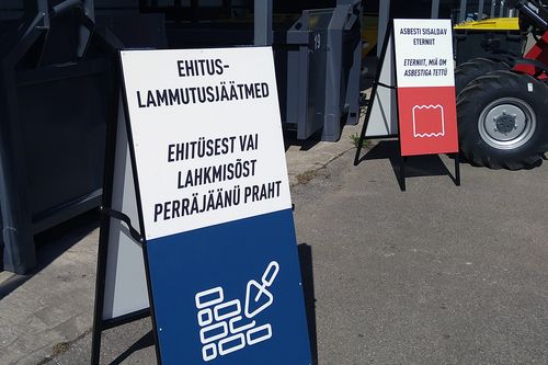 Photo of the pictogram system in use at a waste station